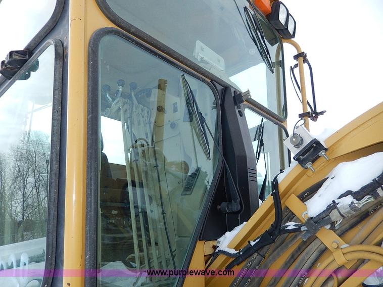 image for item H1314 1999 Caterpillar 140H articulated motor grader