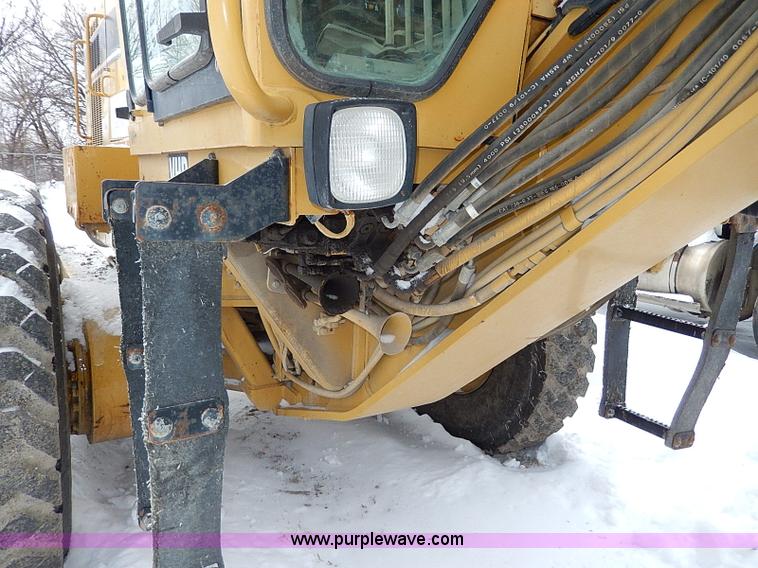 image for item H1314 1999 Caterpillar 140H articulated motor grader