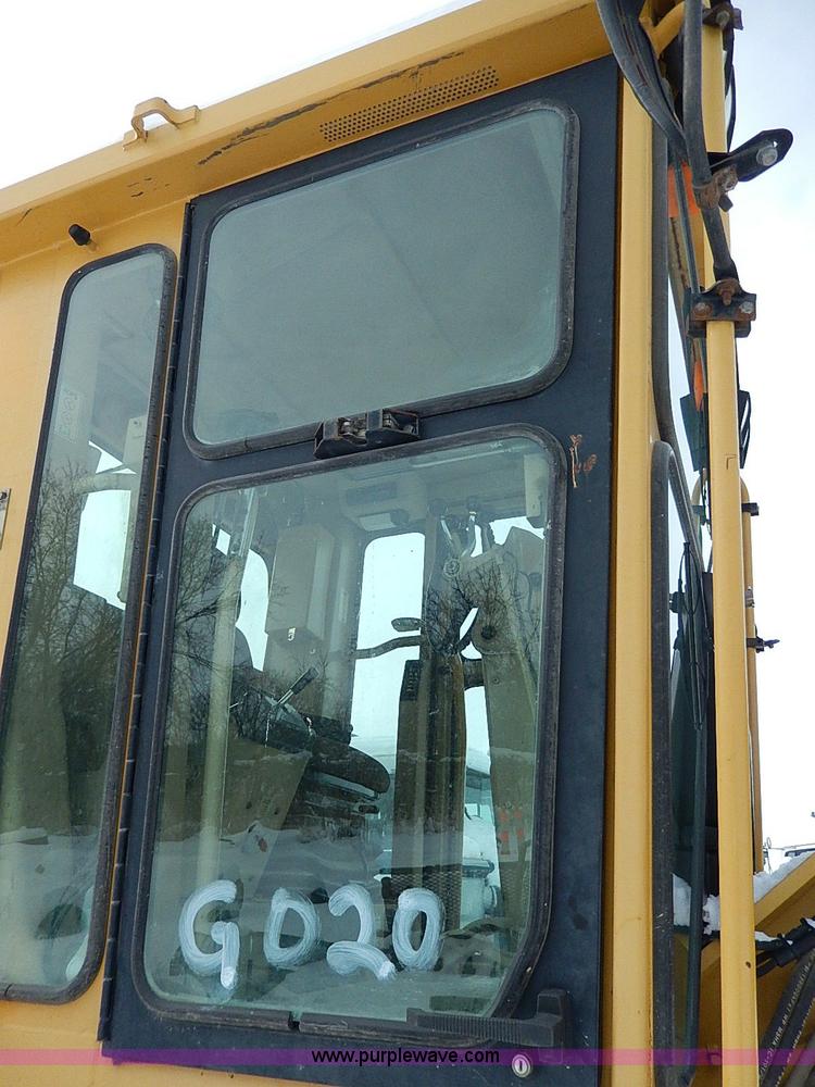 image for item H1314 1999 Caterpillar 140H articulated motor grader