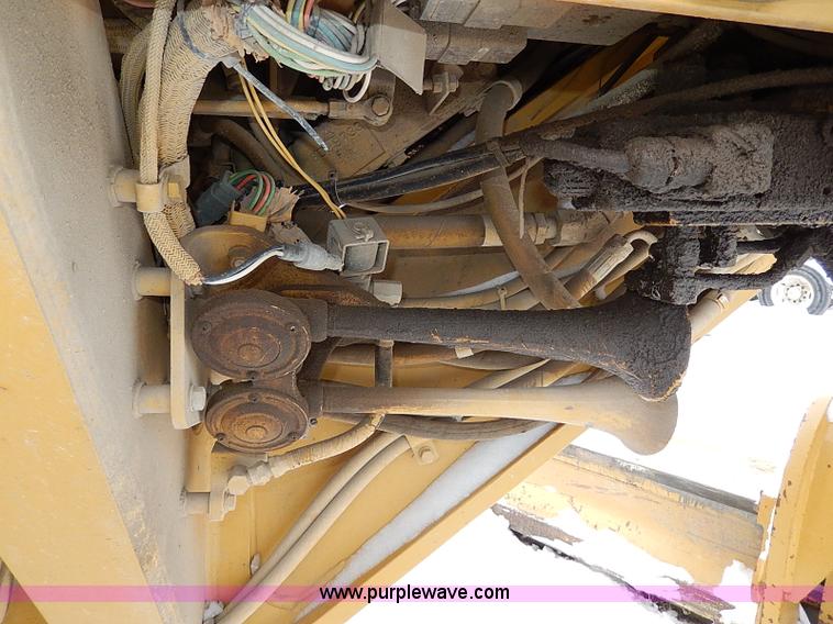 image for item H1314 1999 Caterpillar 140H articulated motor grader