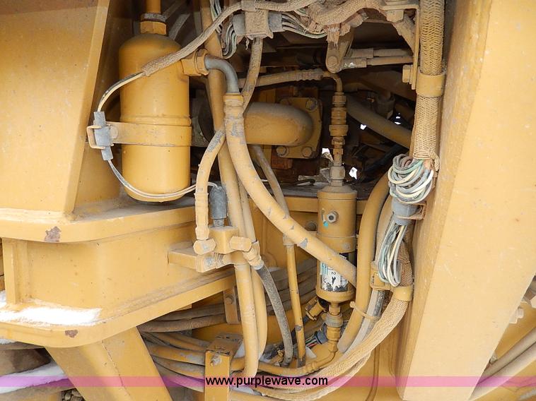 image for item H1314 1999 Caterpillar 140H articulated motor grader