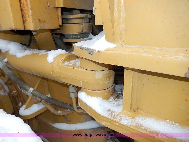 image for item H1314 1999 Caterpillar 140H articulated motor grader