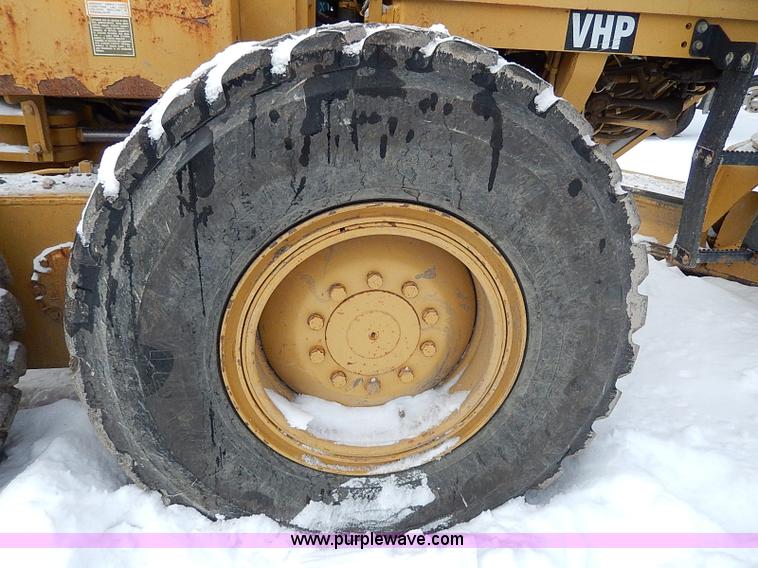 image for item H1314 1999 Caterpillar 140H articulated motor grader