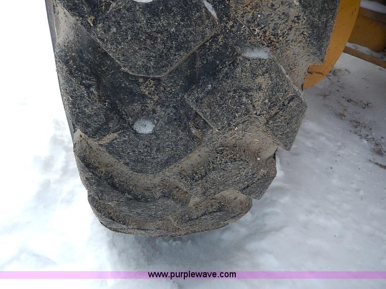 image for item H1314 1999 Caterpillar 140H articulated motor grader