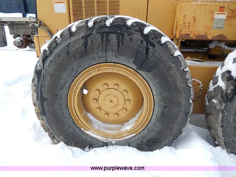 image for item H1314 1999 Caterpillar 140H articulated motor grader