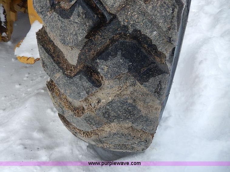 image for item H1314 1999 Caterpillar 140H articulated motor grader