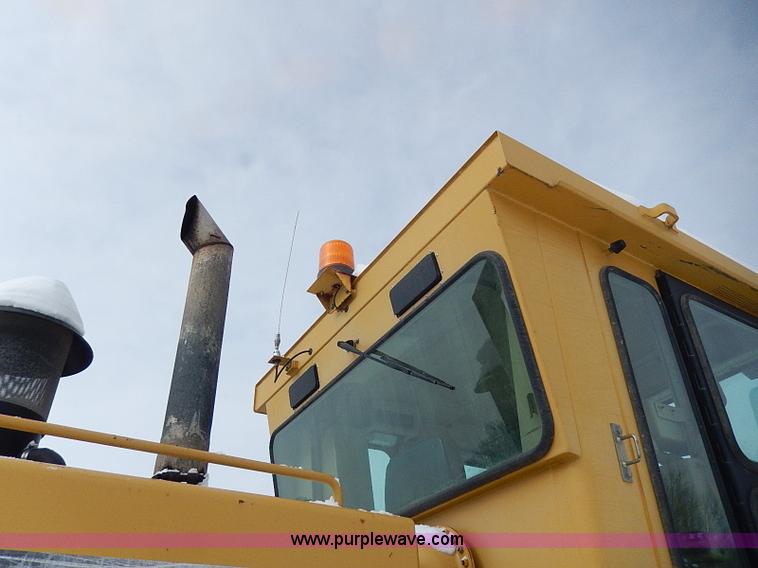 image for item H1314 1999 Caterpillar 140H articulated motor grader