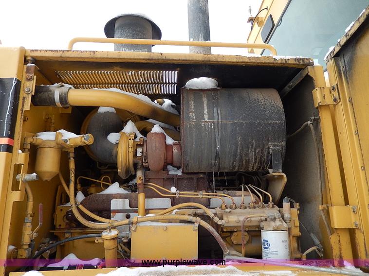 image for item H1314 1999 Caterpillar 140H articulated motor grader