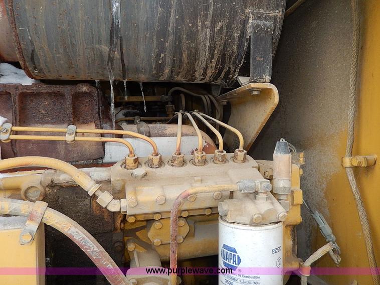 image for item H1314 1999 Caterpillar 140H articulated motor grader