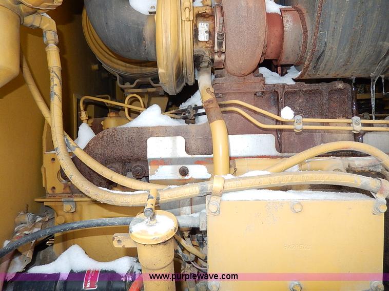 image for item H1314 1999 Caterpillar 140H articulated motor grader