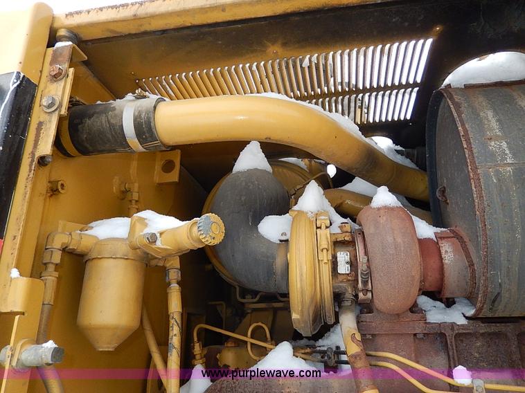 image for item H1314 1999 Caterpillar 140H articulated motor grader