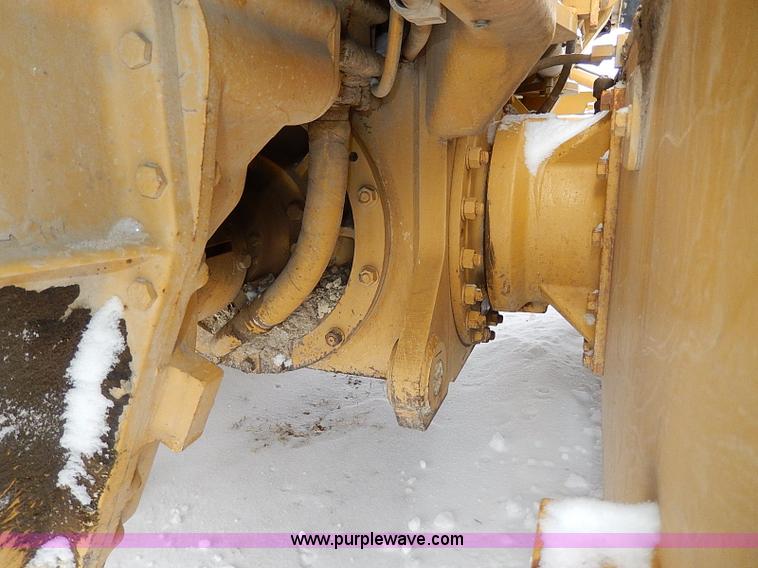 image for item H1314 1999 Caterpillar 140H articulated motor grader