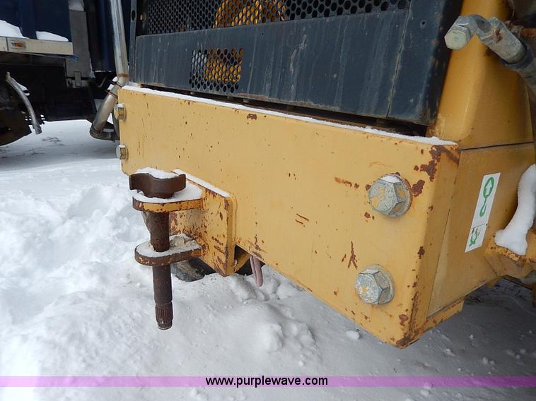 image for item H1314 1999 Caterpillar 140H articulated motor grader