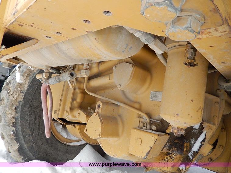 image for item H1314 1999 Caterpillar 140H articulated motor grader