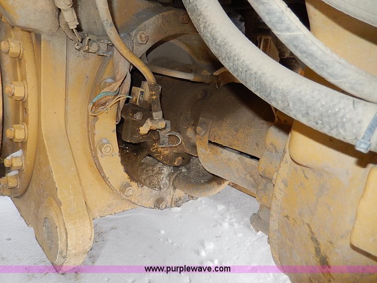 image for item H1314 1999 Caterpillar 140H articulated motor grader