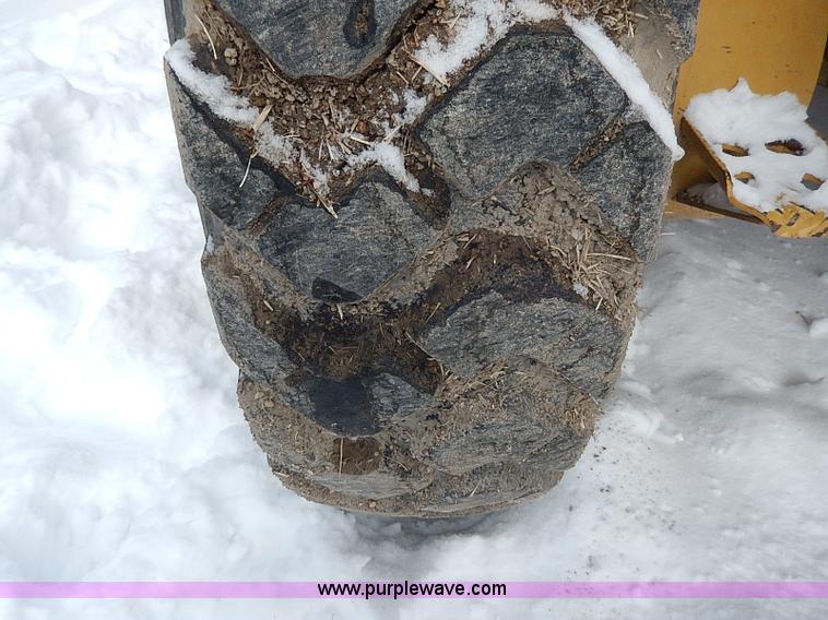 image for item H1314 1999 Caterpillar 140H articulated motor grader