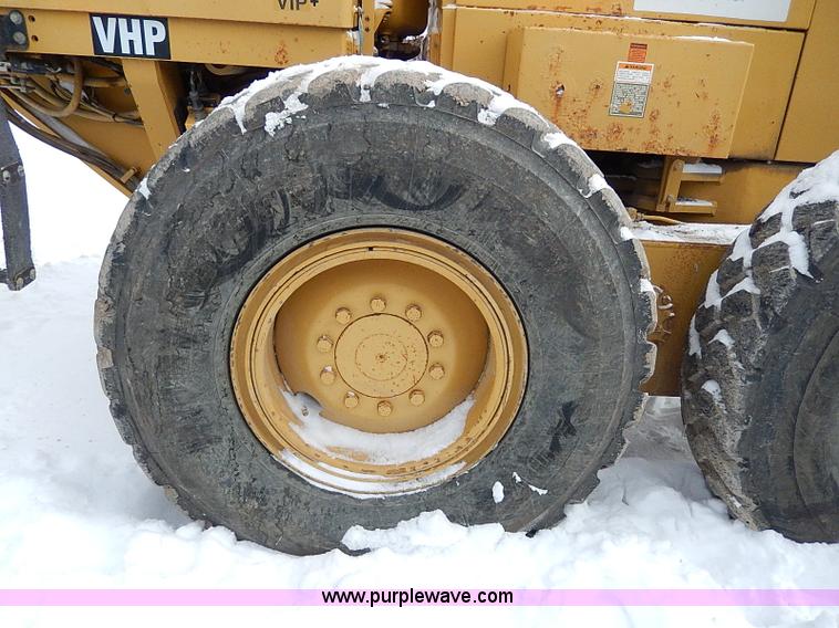 image for item H1314 1999 Caterpillar 140H articulated motor grader