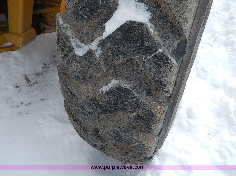 image for item H1314 1999 Caterpillar 140H articulated motor grader