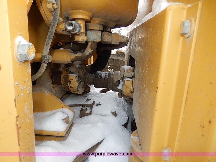 image for item H1314 1999 Caterpillar 140H articulated motor grader