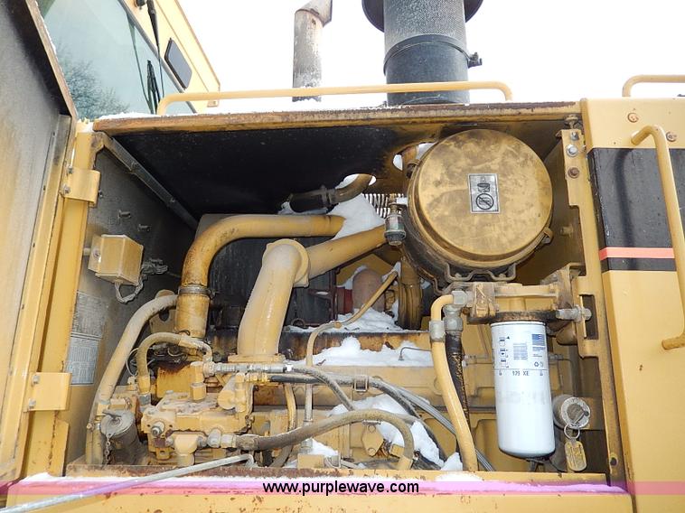 image for item H1314 1999 Caterpillar 140H articulated motor grader