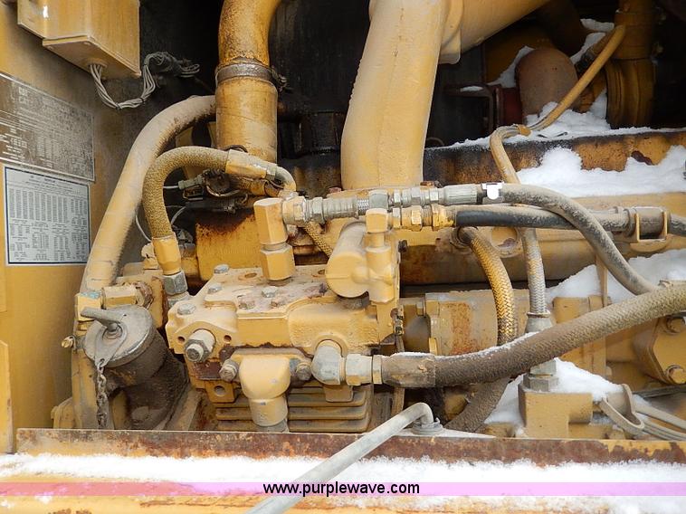 image for item H1314 1999 Caterpillar 140H articulated motor grader