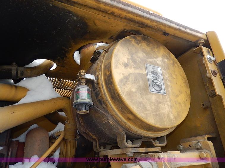 image for item H1314 1999 Caterpillar 140H articulated motor grader