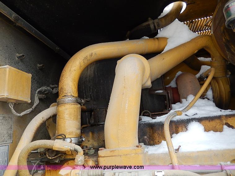 image for item H1314 1999 Caterpillar 140H articulated motor grader