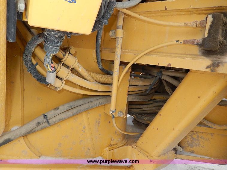 image for item H1314 1999 Caterpillar 140H articulated motor grader