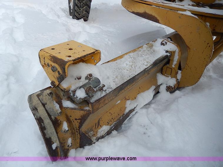 image for item H1314 1999 Caterpillar 140H articulated motor grader