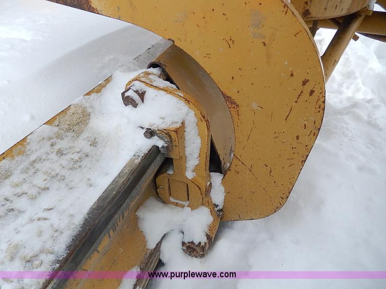 image for item H1314 1999 Caterpillar 140H articulated motor grader