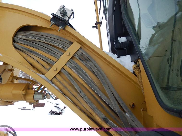 image for item H1314 1999 Caterpillar 140H articulated motor grader