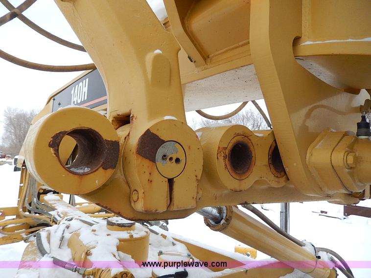 image for item H1314 1999 Caterpillar 140H articulated motor grader