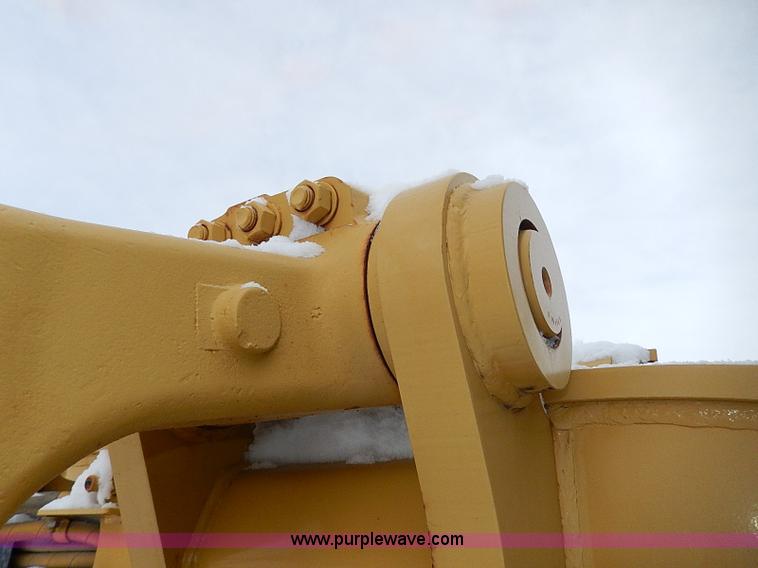 image for item H1314 1999 Caterpillar 140H articulated motor grader