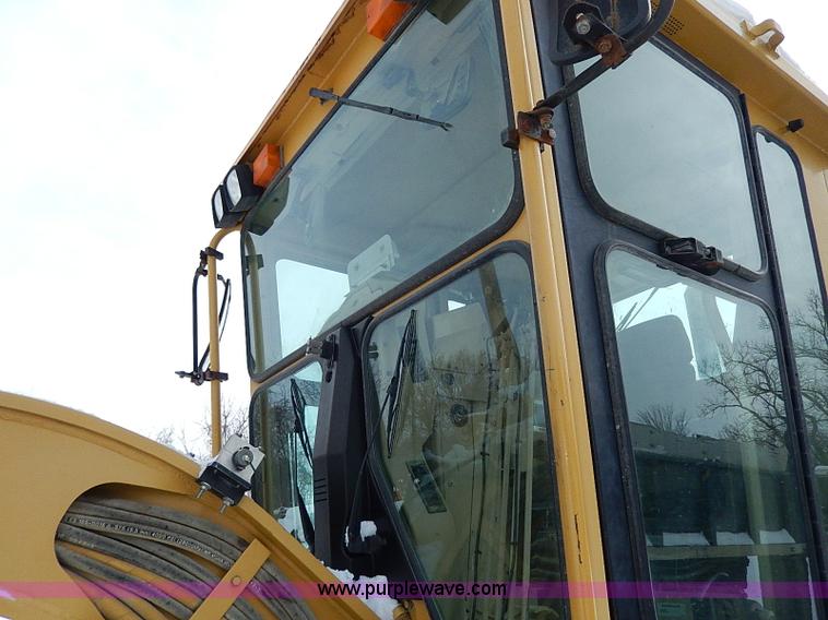 image for item H1314 1999 Caterpillar 140H articulated motor grader