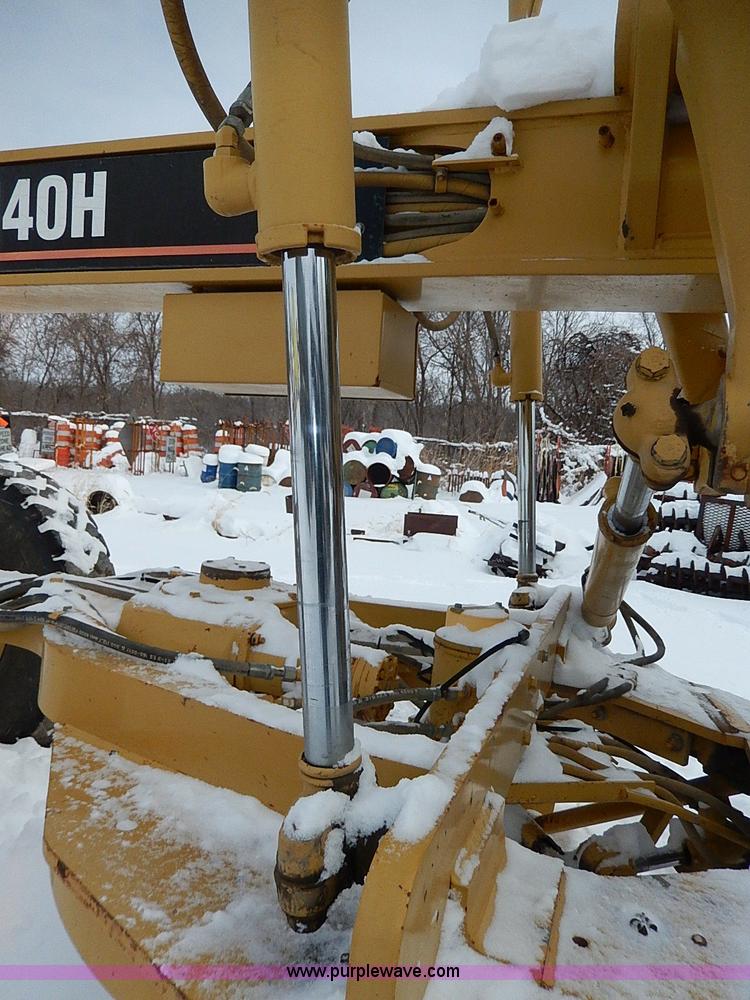 image for item H1314 1999 Caterpillar 140H articulated motor grader