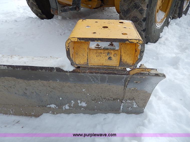 image for item H1314 1999 Caterpillar 140H articulated motor grader