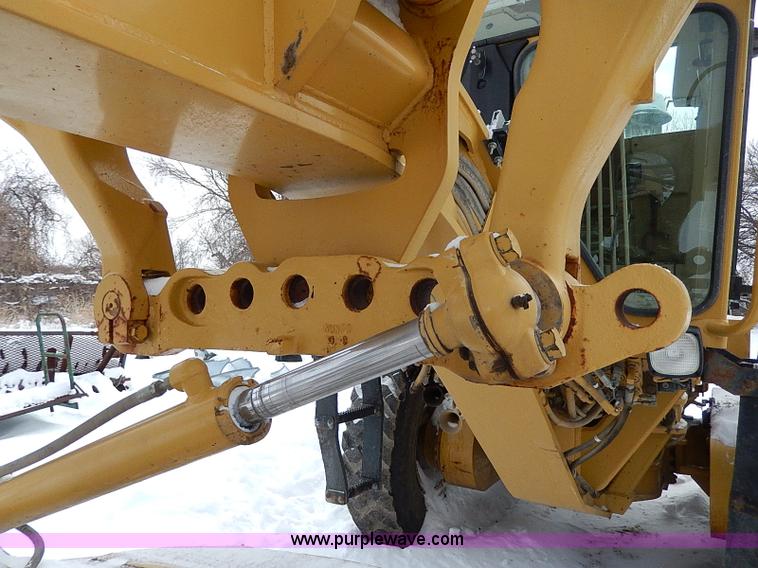 image for item H1314 1999 Caterpillar 140H articulated motor grader