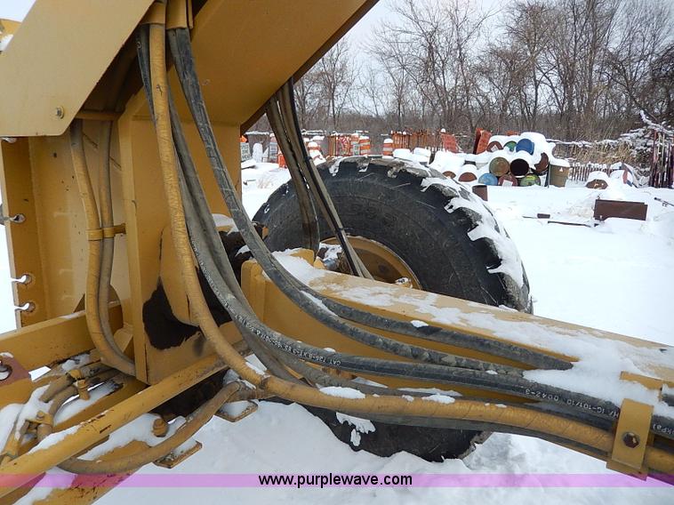image for item H1314 1999 Caterpillar 140H articulated motor grader