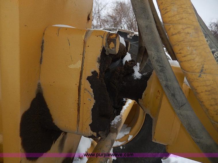 image for item H1314 1999 Caterpillar 140H articulated motor grader