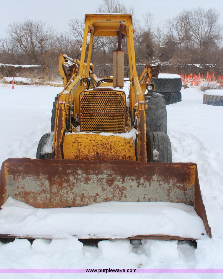 image for item H7791 Ford 445 backhoe