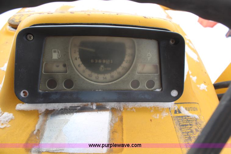 image for item H7791 Ford 445 backhoe