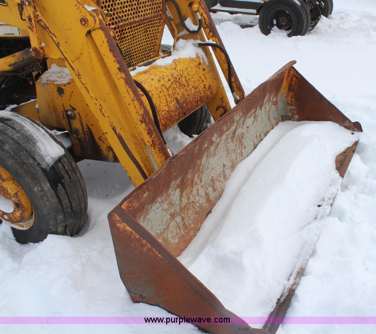 image for item H7791 Ford 445 backhoe