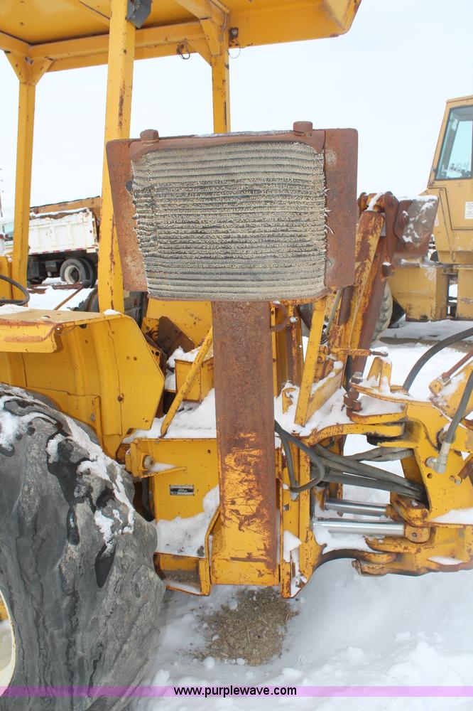 image for item H7791 Ford 445 backhoe