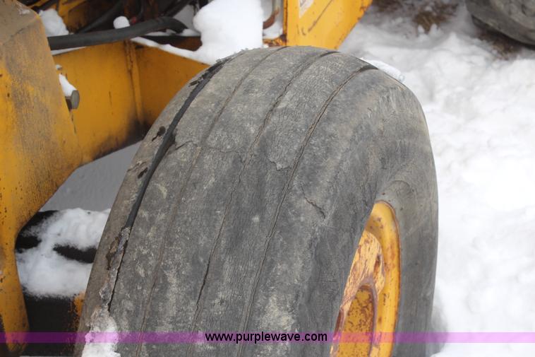 image for item H7791 Ford 445 backhoe