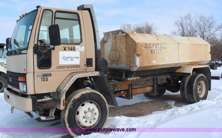 image for item H7807 1987 Ford CF6000 water truck