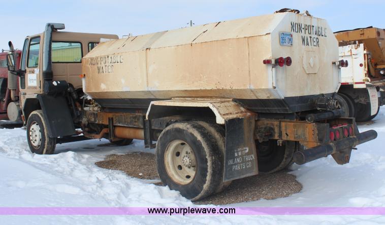 image for item H7807 1987 Ford CF6000 water truck
