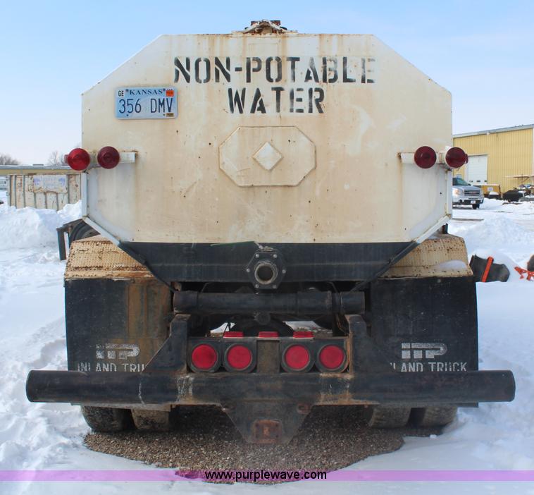 image for item H7807 1987 Ford CF6000 water truck