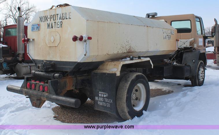 image for item H7807 1987 Ford CF6000 water truck