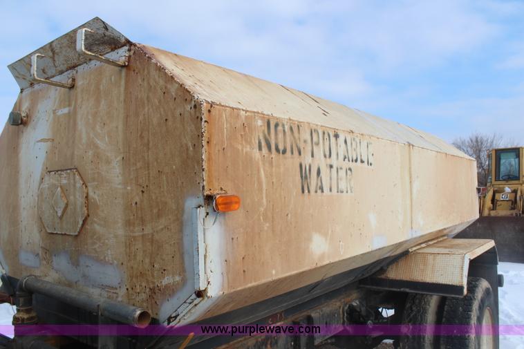 image for item H7807 1987 Ford CF6000 water truck