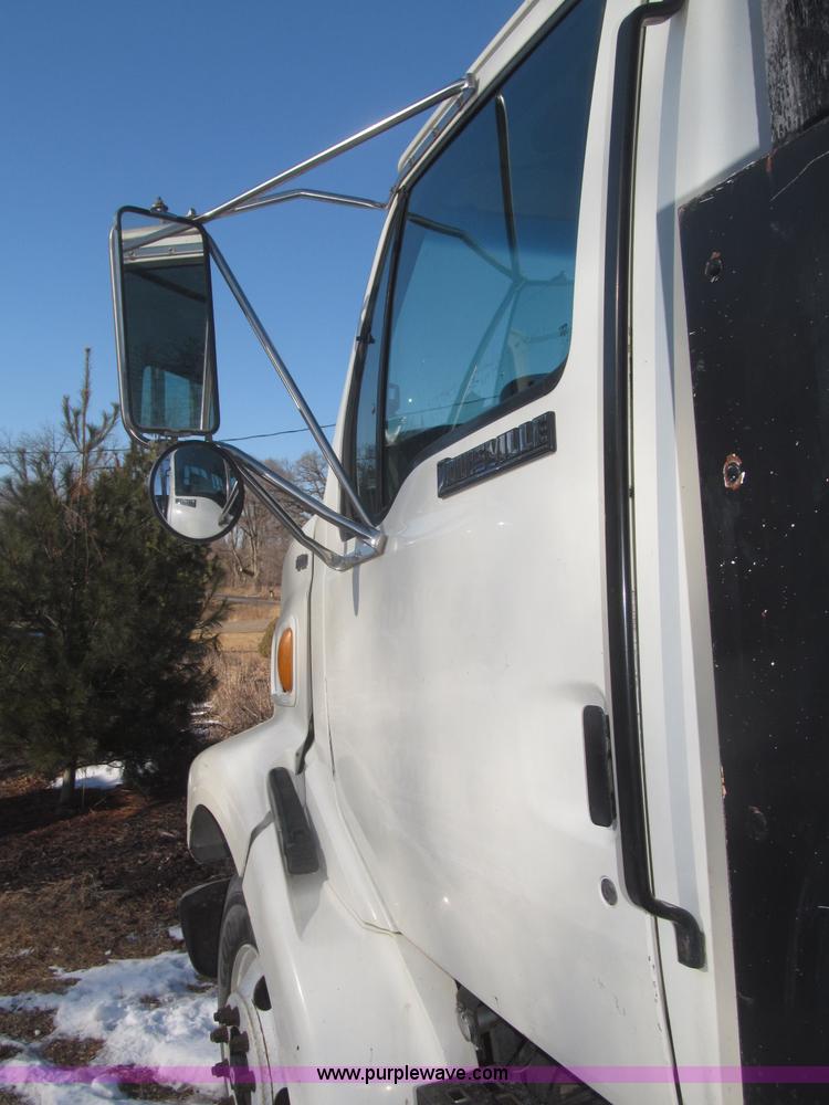 image for item F7252 1997 Ford L8501 Louisville 20' flatbed truck with lift gate